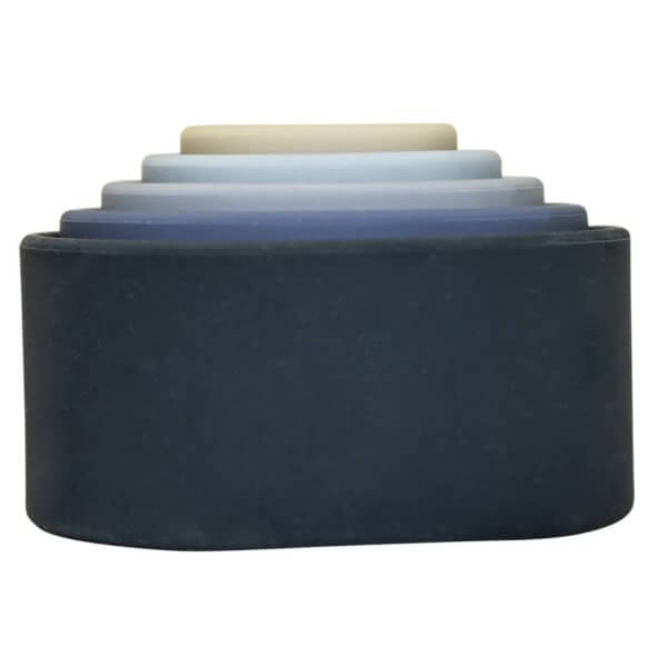 Blue silicone stacking cups | Bambino Eco Toys Set of five nested circular discs in varying shades from dark blue to pale beige, arranged in a stepped stack.