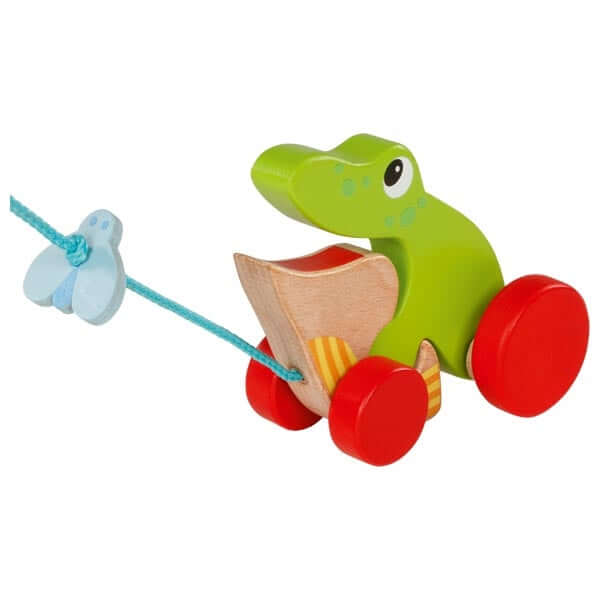 Goki pull along wooden frog catching a fly