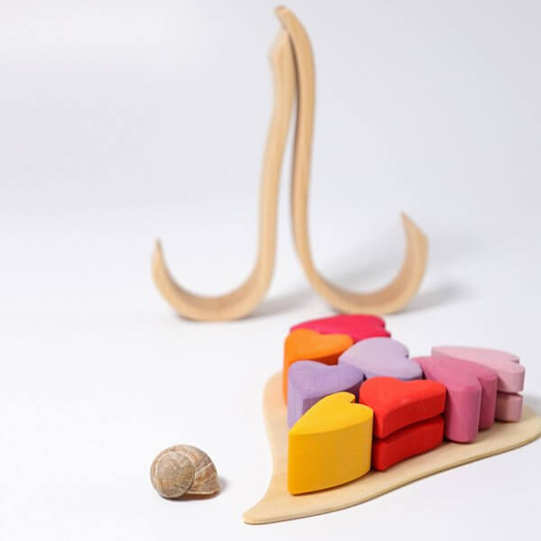Grimms wooden red pink mauve hearts shaped blocks puzzle with 4cm blocks