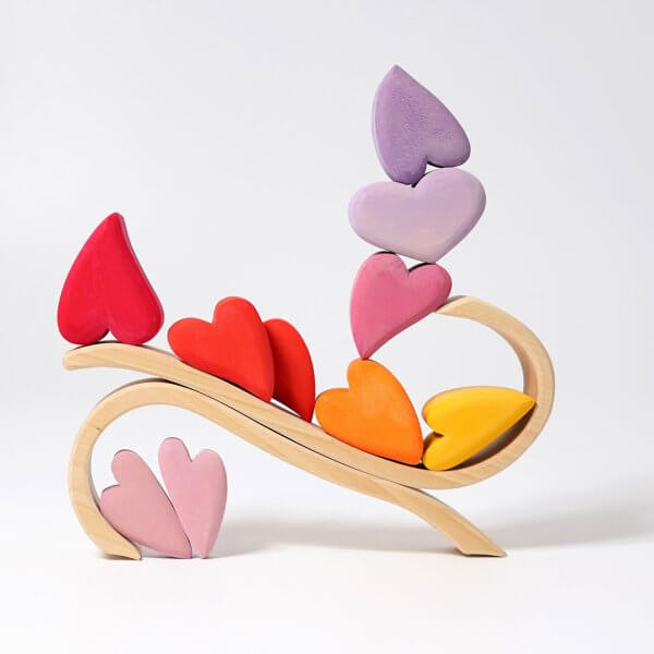 Grimms wooden red pink mauve hearts shaped blocks puzzle with 4cm blocks